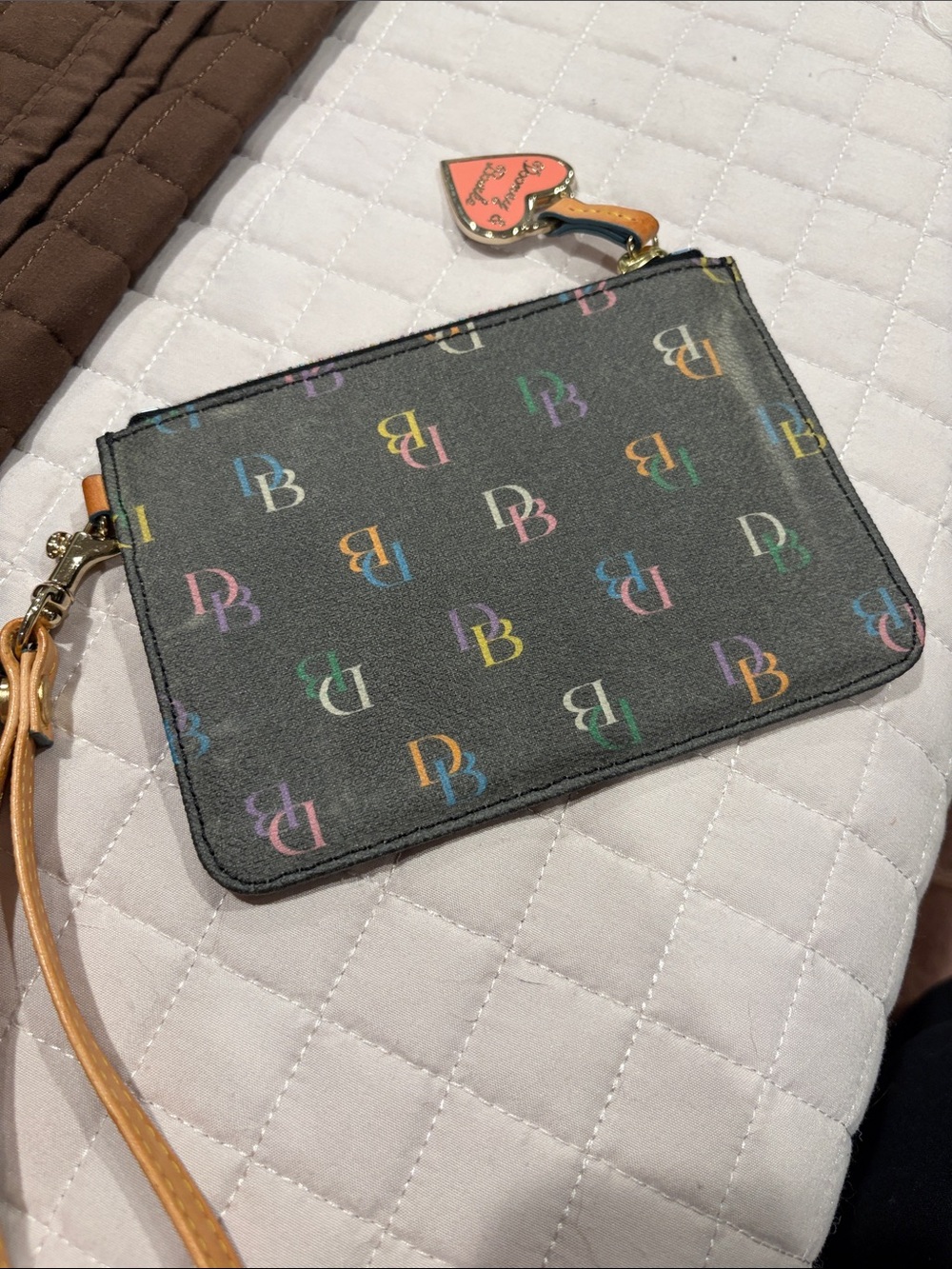 Dooney & Bourke Black Wristlet with Pastel Multicolor Logo Print